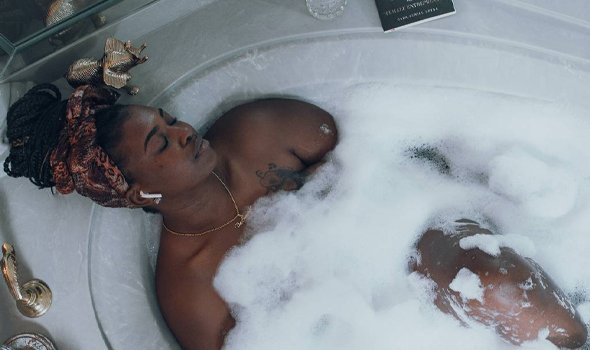 A woman having a bubble bath